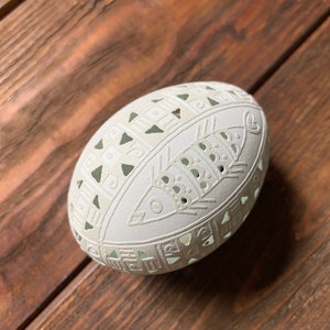 Ukrainian carved pysanka on araucana chicken egg: fish image 4