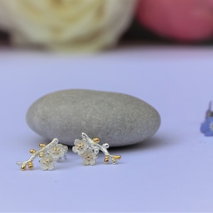 White flower branch stud earrings