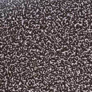 May include: Close-up of a dark brown textured surface with a speckled white pattern. The surface has a rough, uneven texture.