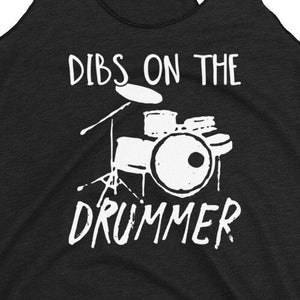 May include: Black tank top with white text that reads "Dibs on the drummer" and a graphic of a drum set.