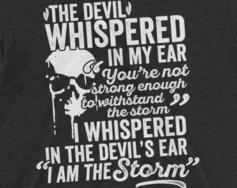 I Am The Storm Unisex Triblend T-Shirt | The Devil Whispered In My Ear | Motivational Shirt for Cancer Survivor | Christian Bible Shirt