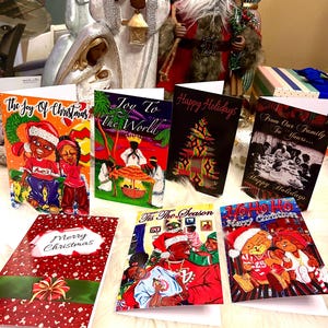 Vakantie kerstgroeten collectie. Black Santa Sale... Volledige collectie Alle 7 wenskaarten, regelmatig te koop voor vijf dollar per stuk.