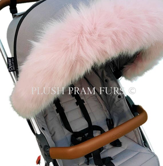 pink pram with fur hood
