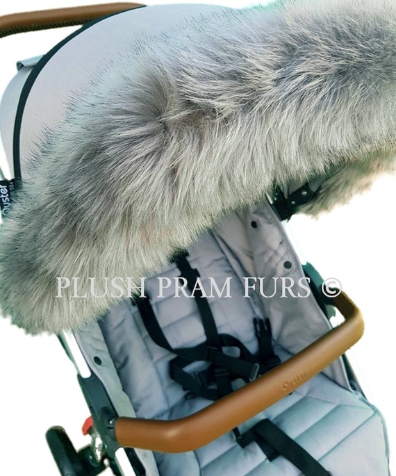 grey pram with fur