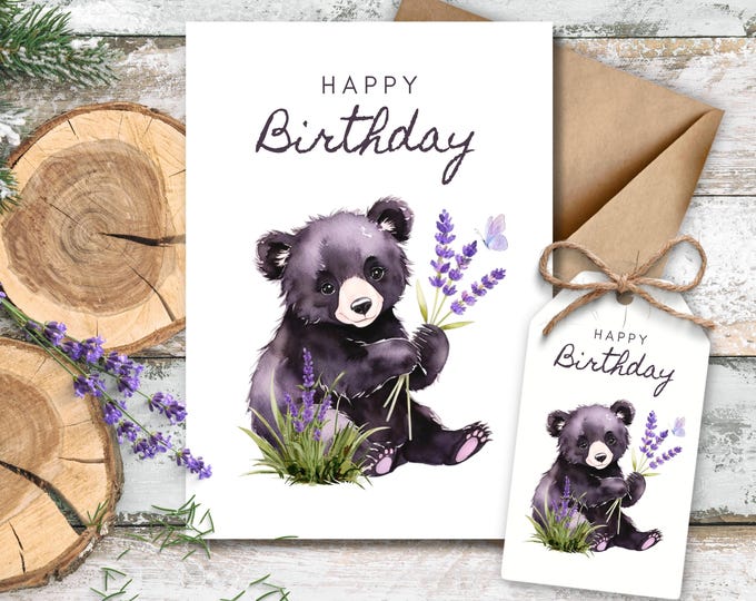 Happy Birthday Baby Black Bear Holding a Lavender Bouquet Watercolor Greeting Card, Lover of Bears Floral Birthday Card, Cute Bear in Nature