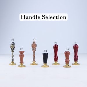 May include: A selection of seven wax seal stamp handles, each with a unique design. The handles are made of various materials, including wood and metal, and are displayed on a white background. The text "Handle Selection" is at the top.