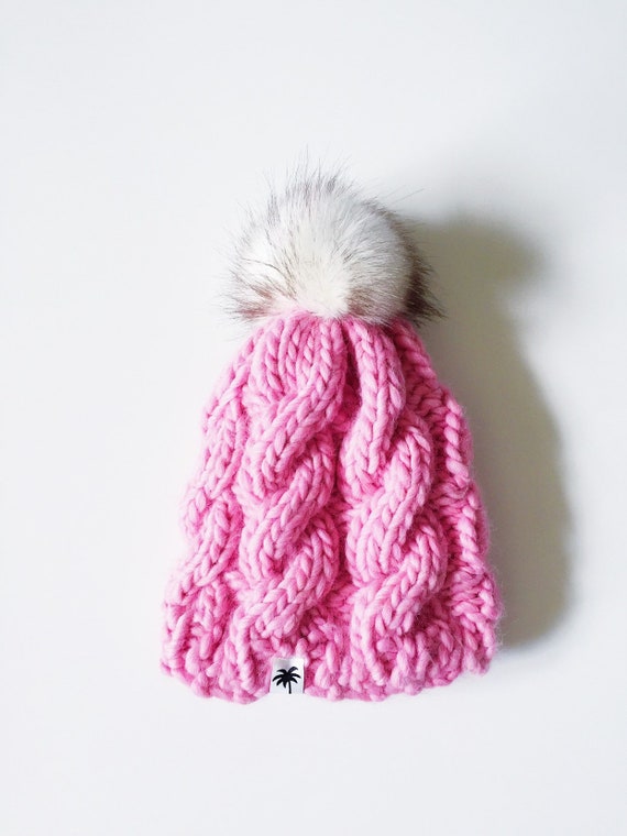 wool hat with fur pom pom