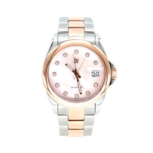 May include: A two-tone silver and rose gold watch with a pink mother-of-pearl face and diamond accents. The watch has a date window at the 3 o'clock position and says "Quartz" below the 12 o'clock position.