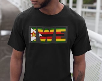May include: Black t-shirt with the word "WE" in a rectangular design. The letters are filled with the colors of the Zimbabwean flag: green, yellow, red, and black. The letter "W" features the Zimbabwean flag.