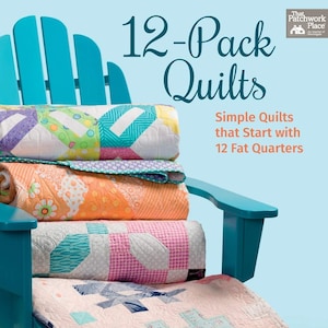 May include: A book titled 12-Pack Quilts: Simple Quilts that Start with 12 Fat Quarters by Barbara Groves and Mary Jacobson. The cover features a stack of four colorful patterned quilts resting on a bright turquoise Adirondack chair.
