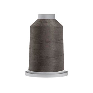 May include: A spool of dark gray thread, ideal for sewing and embroidery projects. The thread is tightly wound on a white base with a gray top. The thread appears smooth and has a slight sheen, perfect for various fabric types.