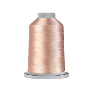 May include: A spool of metallic rose gold embroidery thread featuring a smooth, reflective finish. The thread is wound tightly around a cylindrical plastic core with a flat base and a top cap, showcasing a consistent, shimmering light pink hue.