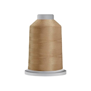 May include: A spool of light brown sewing thread featuring a cylindrical shape with a flat top and a wider base. The thread is wound tightly around the central core, displaying a smooth, consistent texture and a soft, neutral tan color throughout.