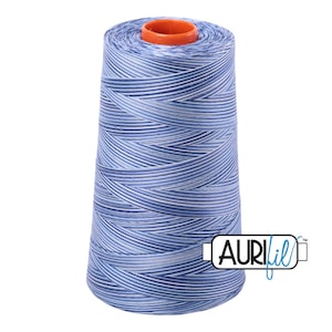 May include: A spool of blue and white striped thread with the Aurifil logo on the side.