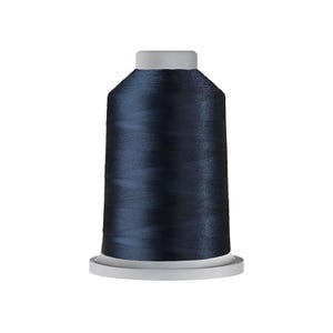 May include: A spool of dark navy blue sewing thread. The thread is wound tightly around a cylindrical core with a flat white base and a flat white top. The surface of the thread has a smooth, slightly reflective texture, showing the individual strands.