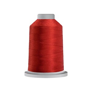 May include: A spool of red embroidery thread.