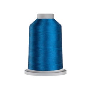May include: A spool of vibrant royal blue sewing thread featuring a smooth, lustrous finish. The thread is tightly wound around a cylindrical core with a flat white base and a matching white top cap, creating a clean and uniform appearance.