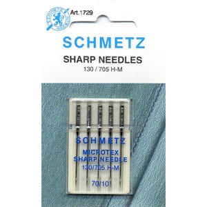May include: A package of five silver sewing needles labeled "Schmetz Microtex Sharp Needle 130/705 H-M 70/10".