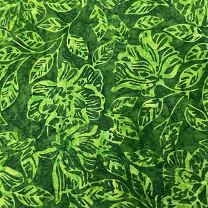 May include: Green fabric with a floral pattern. The fabric features a repeating pattern of green leaves and flowers.