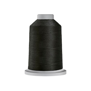 May include: A spool of black thread for sewing.