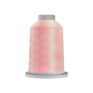 May include: A spool of light pink sewing thread featuring a smooth, cylindrical shape with a flat top and base. The thread is wound tightly around the central core, displaying a consistent, soft pastel color throughout the entire surface area.