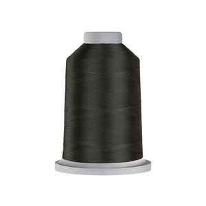 May include: A large spool of dark charcoal gray sewing thread. The thread is tightly wound around a cylindrical plastic core that features a flat, light gray base and a matching light gray top cap, providing a clean and uniform appearance.