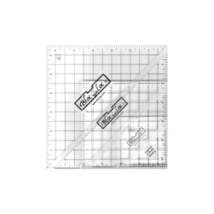 May include: A clear, square quilting ruler with grid lines and diagonal markings. The ruler features the text "Bloc Loc" in a black and white design. The ruler is marked with inch measurements along the edges.