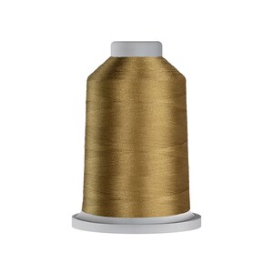 May include: A spool of metallic gold embroidery thread featuring a smooth, lustrous finish wrapped around a white plastic core. The thread is wound tightly in a uniform pattern, creating a consistent texture across the entire surface of the spool.