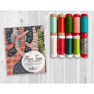 May include: A set of ten spools of thread in various colors including mint, red, olive, coral, teal, white, and grey, alongside a square fabric panel featuring a tree design with the text Moon Trees by Jo Avery and Aurifil branding.