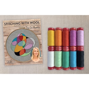 May include: A set of ten spools of Aurifil wool thread in various colors, including yellow, orange, red, purple, lavender, white, light green, green, blue, and black, alongside a book titled Stitching with Wool by Jo Avery.