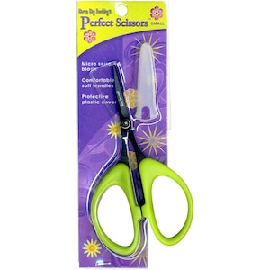 May include: Green handled scissors with a black blade and a protective plastic cover. The packaging features the text "Karen Kay Buckley's Perfect Scissors SMALL".