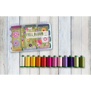 May include: A clear plastic storage case containing spools of thread, labeled FULL BLOOM BY BARBARA PERSING & MARY HOOVER, alongside a row of twelve individual thread spools in various colors including white, yellow, orange, red, pink, purple, and green.