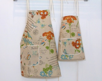 Apron set per la madre e il bambino, per le ragazze di campagna in casa e giardino