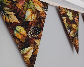 Autumn leaves and pine cones bunting. Fabric fall decoration.