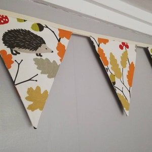 Hedgehogs, acorns and oak leaves Fabric Bunting, on a cream background. 10 flags, approx 2.5 metres