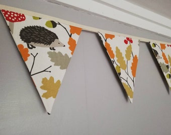 Hedgehogs, acorns and oak leaves Fabric Bunting, on a cream background. 10 flags, approx 2.5 metres