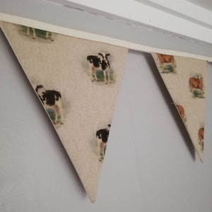 Farmyard animals fabric bunting, goats, piglets, cows and sheep.