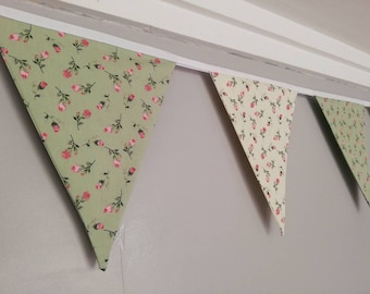 Rose buds fabric bunting on cream and green background