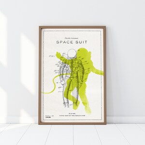 May include: A vintage illustration of a flexible astronaut space suit patent drawing. The drawing is in black and white with a green watercolor wash behind the astronaut. The text reads "Flexible Astronaut Space Suit" and "FIG. 1".