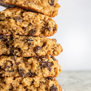 Our oatmeal raisin cookie is a flavorful brown sugar and cinnamon cookie filed with plump raisins and a touch of molasses.