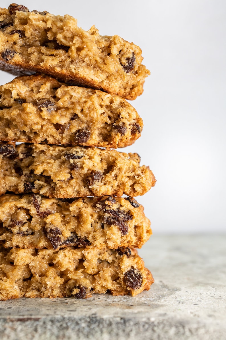 Our oatmeal raisin cookie is a flavorful brown sugar and cinnamon cookie filed with plump raisins and a touch of molasses.