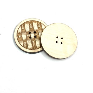 May include: Two wooden buttons, one with a checkered pattern and the other plain. Both buttons have four holes.