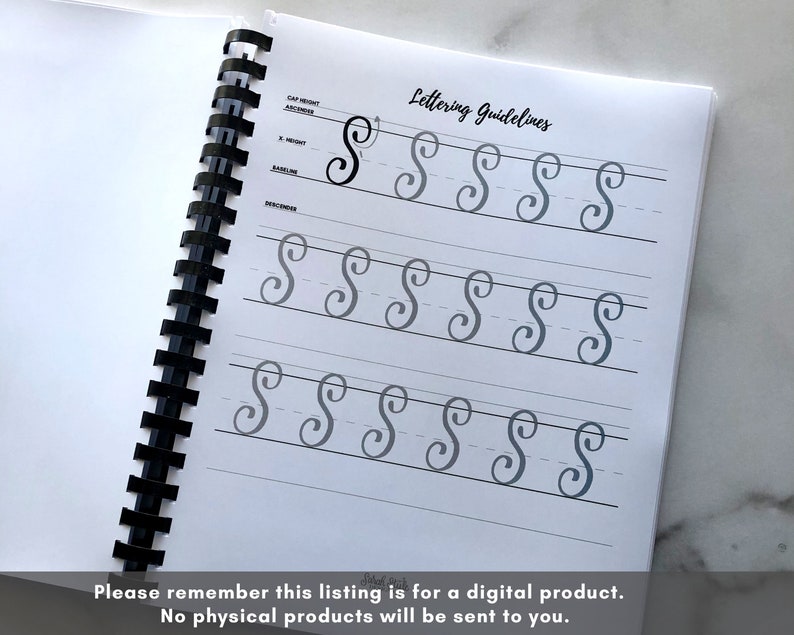 May include: A black and white image of a spiral bound notebook with the text "Lettering Guidelines" at the top of the page. The page has multiple rows of the letter "S" written in cursive.