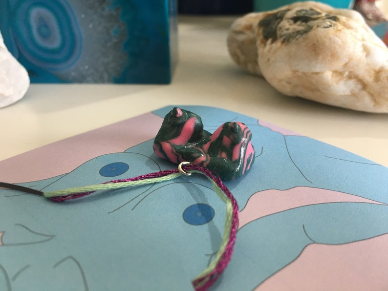 green and prink swirl pattern boob pendant necklace