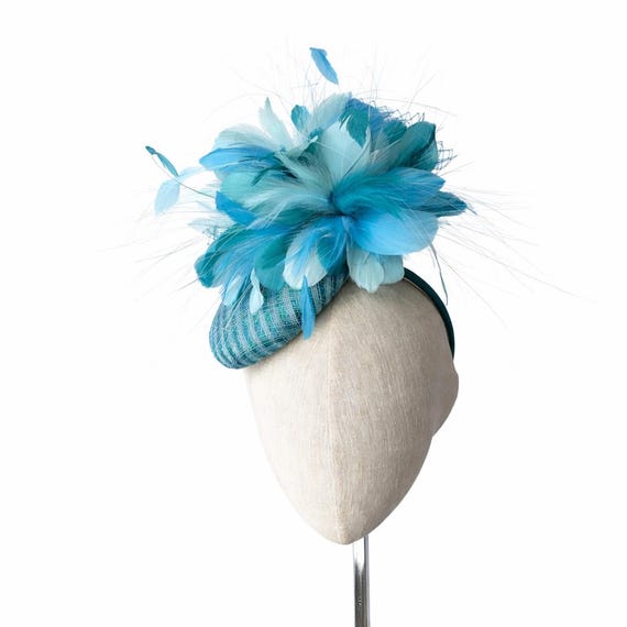 RIO - Blue, green and aqua feathers on multi colored button cocktail hat