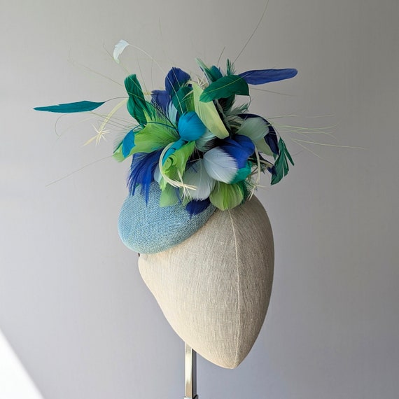 Light blue, aquas greens and blues feather hat