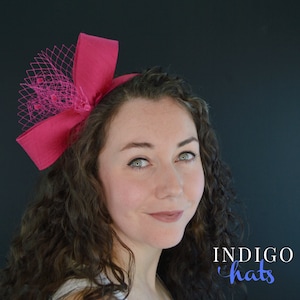 Pink Bow headband for women. Pin up girl retro style fascinator. Holiday party, christmas gift. Silk designer hairband with veiling.
