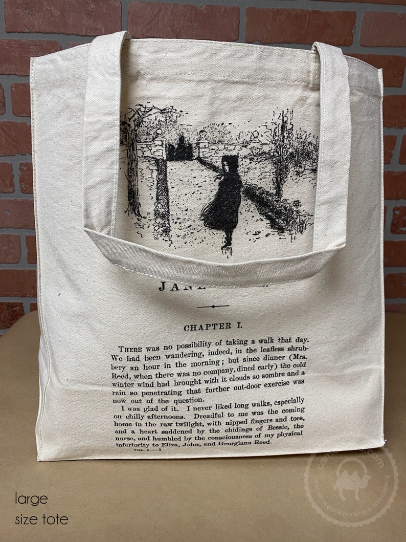 May include: A large, natural-colored canvas tote bag with a black and white illustration of a girl walking in a forest. The bag has black handles and the text "Jane" and "Chapter I." printed on the front.  There was no possibility of taking a walk that day. We had been wandering, indeed, in the leafless shrubbery an hour in the morning; but since dinner (Mrs. Reed, when there was no company, dined early) the cold winter wind had brought with it clouds so sombre and a rain so penetrating that further out-door exercise was now out of the question.