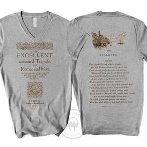 May include: A gray V-neck t-shirt with a vintage-style print of the title page from the first edition of Romeo and Juliet. The back of the shirt features a vintage illustration of a city street and a portion of the prologue from the play.