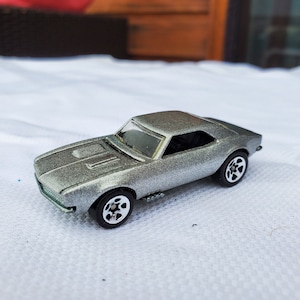 Hot Wheels! Set of Three (3) Camaros. 1996 67 Chevrolet Camaro, 1996 80s Camaro, 1996 93 Camaro